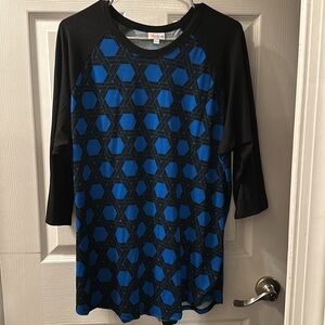 515- this design is fun. It's Lularoe been worn a few times.